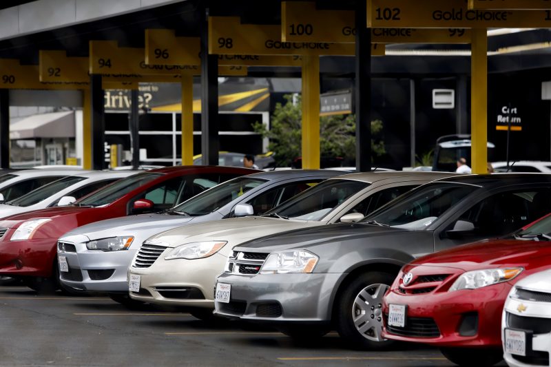 Hertz Global Holdings Inc. rental cars sit parked at the company's location at Los Angeles International Airport (LAX) in Los Angeles, California, U.S., on Friday, July 26, 2013. Hertz Global Holdings Inc. is scheduled to release earnings figures on July 29. Photographer: Patrick T. Fallon/Bloomberg via Getty Images